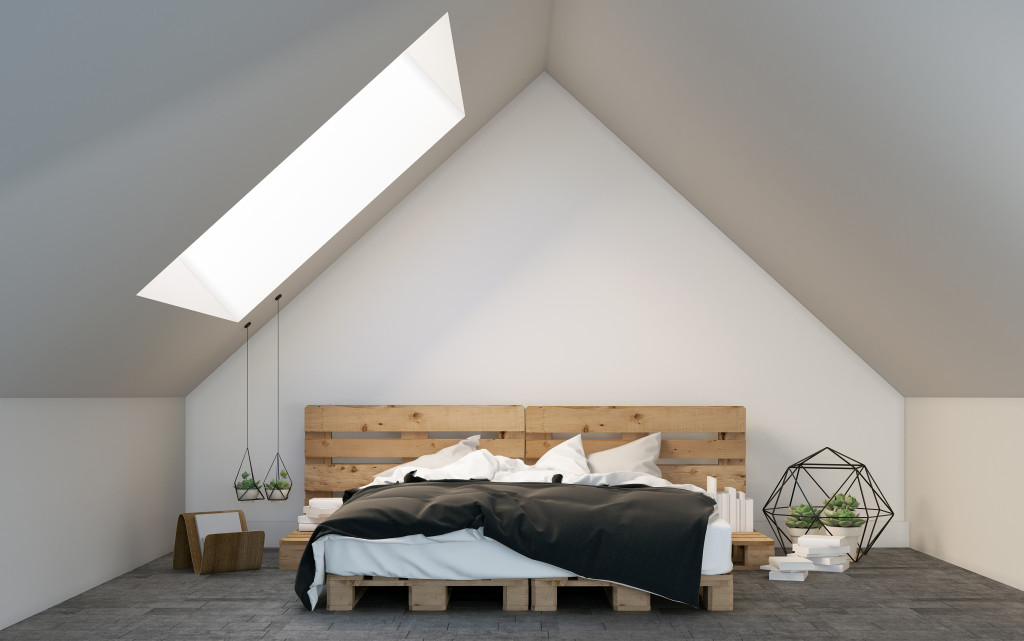 A bed in a loft room